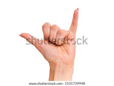 Female hand making phone sign with fingers, isolated on white background. Beautiful hand of woman with copy space.