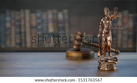 Law and Justice concept. Gavel of the judge, books, scales of justice