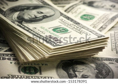 Stack of one hundred dollar bills close-up. Royalty-Free Stock Photo #153178391