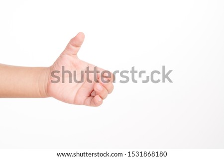 3 years old kid hand holding something like a bottle on white background Royalty-Free Stock Photo #1531868180