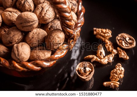 Walnuts on black background. Closeup walnuts.Walnut kernel isolated.