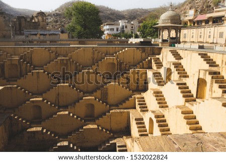 An old stepwell in India, which water stored at the bottom. Royalty-Free Stock Photo #1532022824
