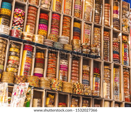 Bangles selling on the streets of India. Royalty-Free Stock Photo #1532027366