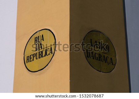 Street signs on the building of Portugal Town, Evora 