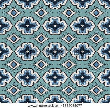 Ikat geometric folklore ornament with diamonds. Damask rug. Tribal ethnic vector texture. Persian geo print. Seamless pattern in Aztec style. Folk embroidery. Gypsy, Mexican, African print. 