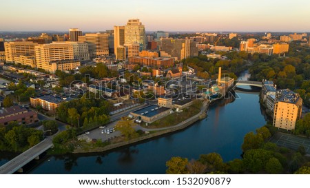 Saturated early morning light hits the buildings and architecture of downtown Wilmington Delaware Royalty-Free Stock Photo #1532090879