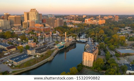 Saturated early morning light hits the buildings and architecture of downtown Wilmington Delaware Royalty-Free Stock Photo #1532090882