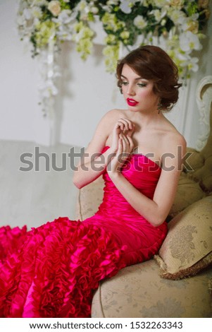 beautiful girl in pink evening dress