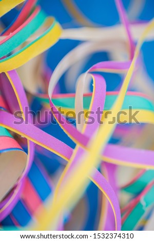 To celebrate a party. We have fun and many colorful streamers decorate us wooden table.