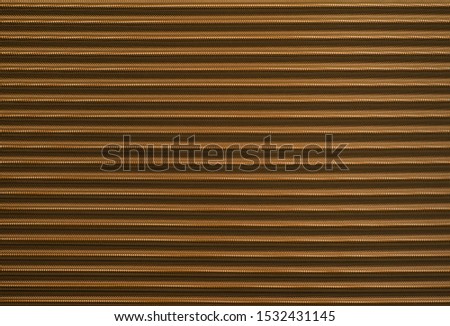 Carbon wave background with stripes. Fiber texture