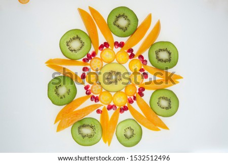 Different fruits all together arranged in a circular shape