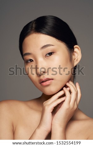 Dark hair beautiful woman Chinese appearance narrow eyes