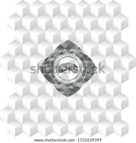video game icon inside realistic grey emblem with cube white background