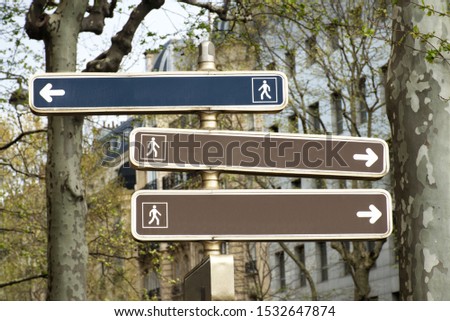 A 3-way directional sign (in Paris) for pedestrians with no text. Add your own texts or directions. This copy space is ideal for powerpoint presentation or something else visual with choices.