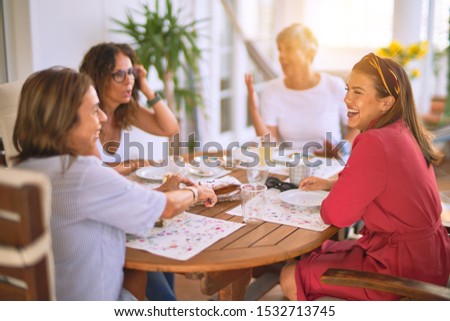 Young beautiful girl smiling happy and confident sitting dinking cup of coffee at terrace