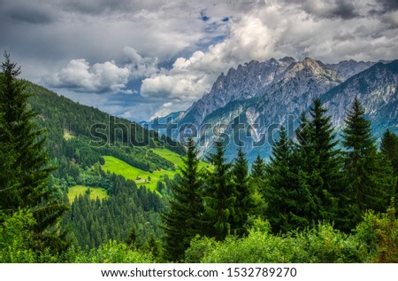Spring ago regrow vegetation in the valleys mountain. HDR image Royalty-Free Stock Photo #1532789270