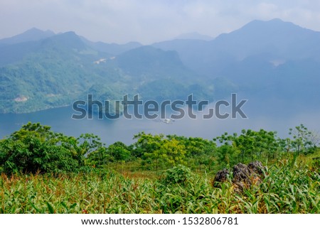 Beautiful landscape of lake in a countryside Vietnam. A view on top of mountain. Royalty high quality stock image of nature landscape.