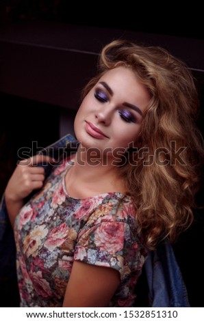 Beautiful woman with evening make-up and perfect skin . Smoky eyes. Fashion photo