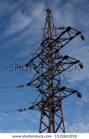 Beautiful, powerful and huge high-voltage poles whose wires create geometry in the blue sky. Look, they are not like each other - they are all different.