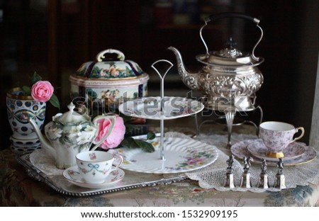 Antique vintage afternoon tea party silver bone China cup saucer display decoration collection Royalty-Free Stock Photo #1532909195