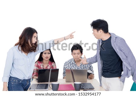 Young angry woman blaming her friend in the business meeting, isolated on white background