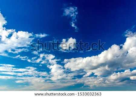 Beautiful blue sky with white clouds in sunny day.