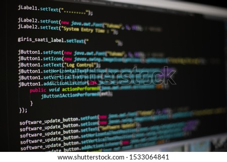  Programming code on computer monitor.  binary code  Software development closeup 