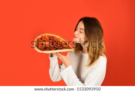 Woman eating pizza. Happy woman eating pizza. Food. Lunch. Pizza. Fastfood. Snack. Food delivery. Pizza slice. Tasty food.