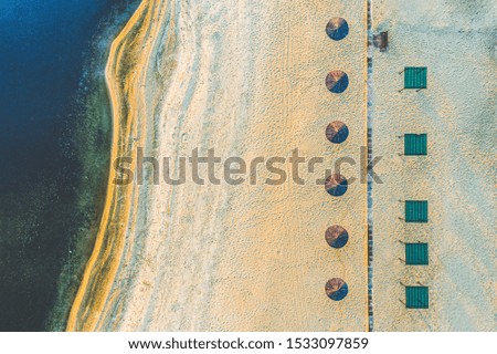 Aerial view from drone top view. Aerial view over autumn empty beach. Beautiful fall nature travel or minimalistic background.