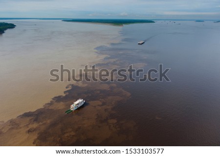 Aerial photo of the Solimões and Rio Negro encounters in Manaus, Amazonia, Brazil