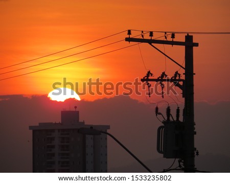 beautiful sunset with electric pole