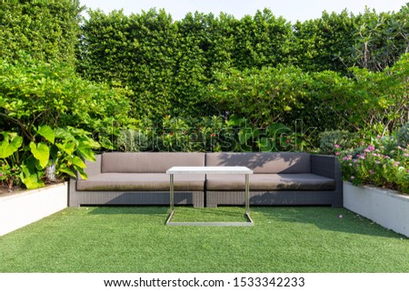 Modern Sofa and furniture on rooftop garden. Royalty-Free Stock Photo #1533342233