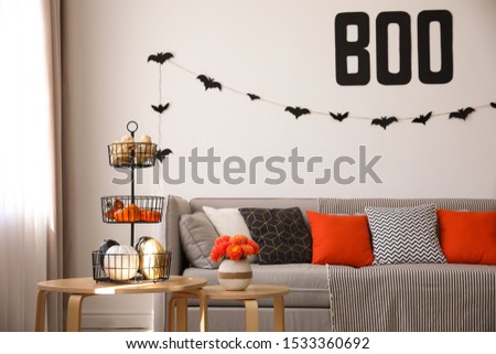 Modern room decorated for Halloween. Festive interior