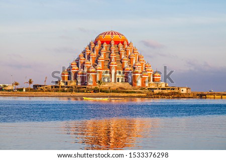 Masjid 99 Kubah (99 Domes Mosque), a beautiful Mosque with unique architecture, located in famous destination, Losari Beach, Makassar, South Sulawesi, Indonesia. A new Landmark of Makassar City, Royalty-Free Stock Photo #1533376298