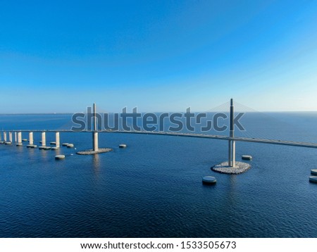 Aerial view of Sunshine Skyway, Tampa Bay Florida, USA. Big steel cable suspension bridge.