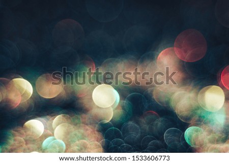 Beautiful light bokeh on a red white and darkness background.