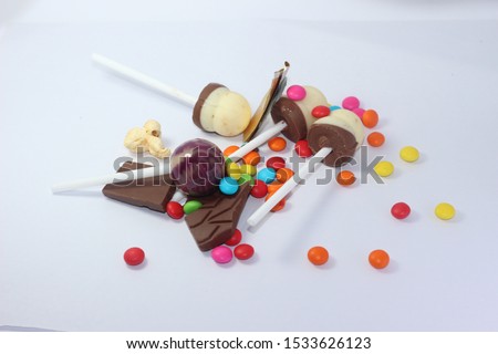 lollipop on a stick carame a white background
