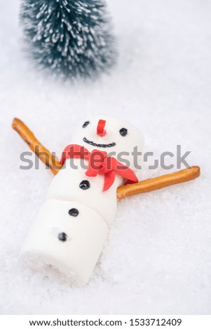 Marshmallow Funny Snowman Play in Snow. Festive Christmas Creative Concept Card.