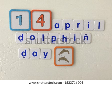 Inscription 14 April dolphin day