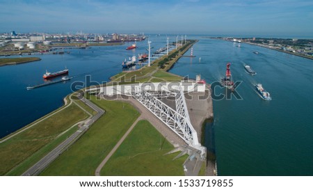 Aerial picture of Maeslantkering storm surge barrier on the Nieuwe Waterweg Netherlands it closes if the city of Rotterdam is threatened by floods and is one of largest moving structures on earth
