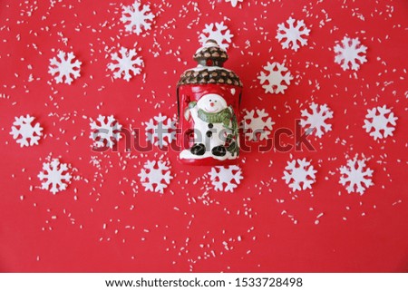 Christmas card with snowflakes and snowman on the red background. Christmas and New Year concept. Copy space for text. Seamless Pattern, background, card.