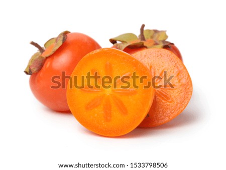 Persimmons on white stock photo