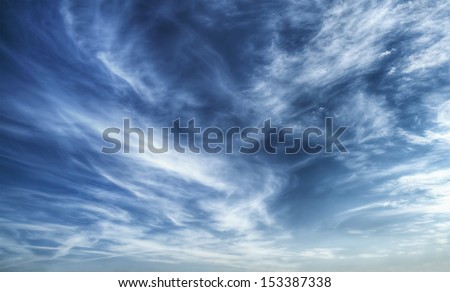 Texture of bright blue dramatic cloudy sky Royalty-Free Stock Photo #153387338
