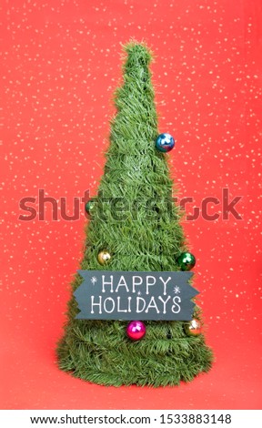 happy Holiday written on tree background