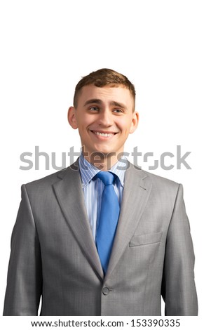 Portrait of a young businessman smiling, on a gray background, isolated on white background