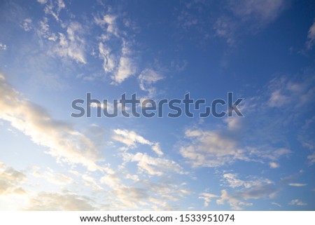 Background image bright sky, white clouds in natural light.