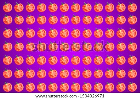 Vegetable pattern of red tomatoes sliced ​​on violet background. Flat lay, top view. Food background.