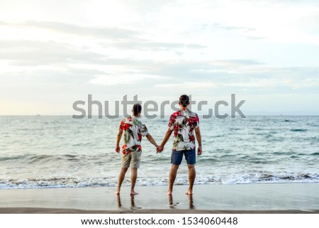 couple gay ocean vacation lgtb Royalty-Free Stock Photo #1534060448