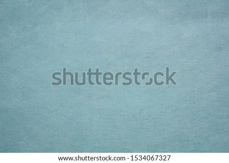background and texture of slate blue Korean hanji paper handmade from inner bark of the mulberry tree