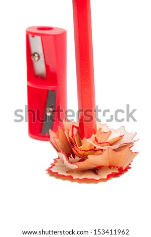 sharpener and red pencil isolated on a white background